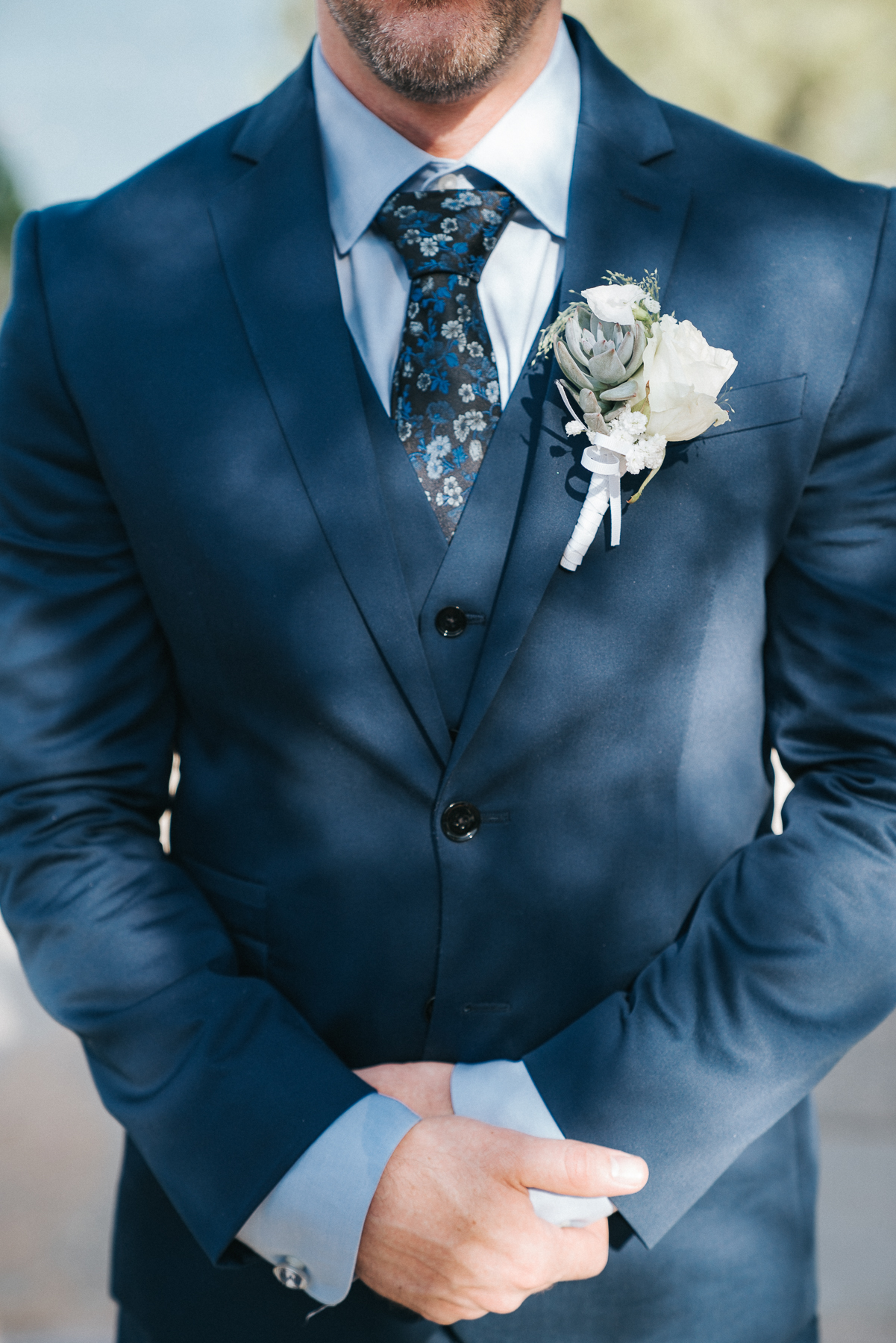 blue suit groom waiting for bride