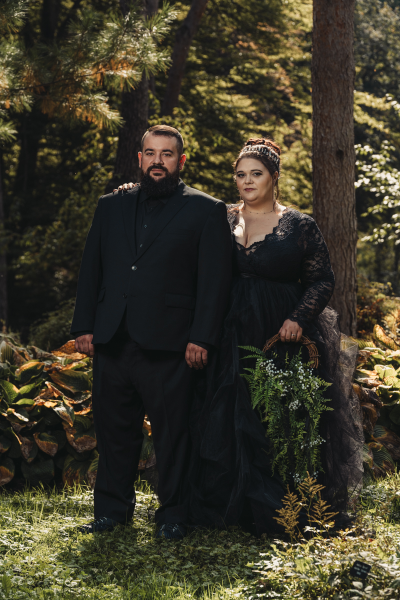 gothic bride and groom outdoors for halloween wedding