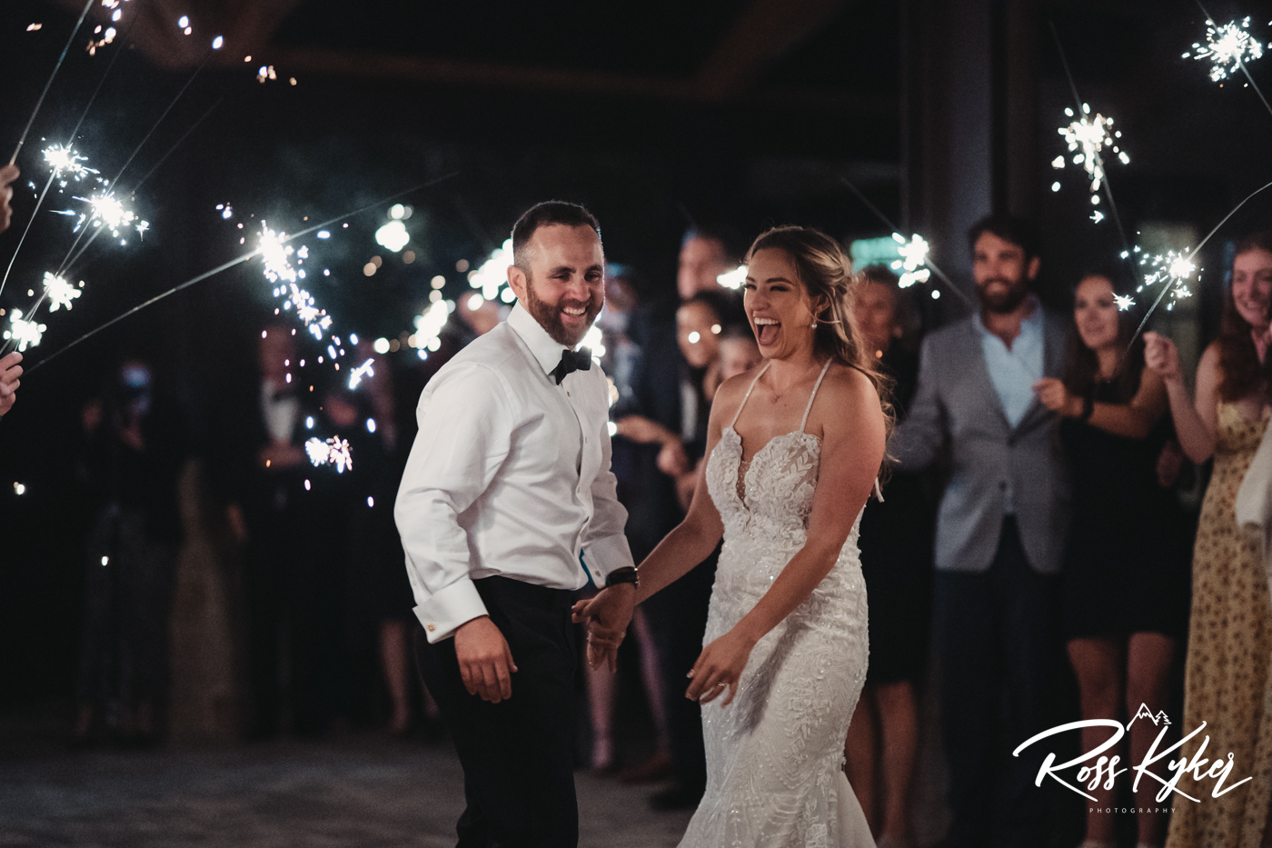 Boulder Colorado wedding photographer bride and groom sparkler exit