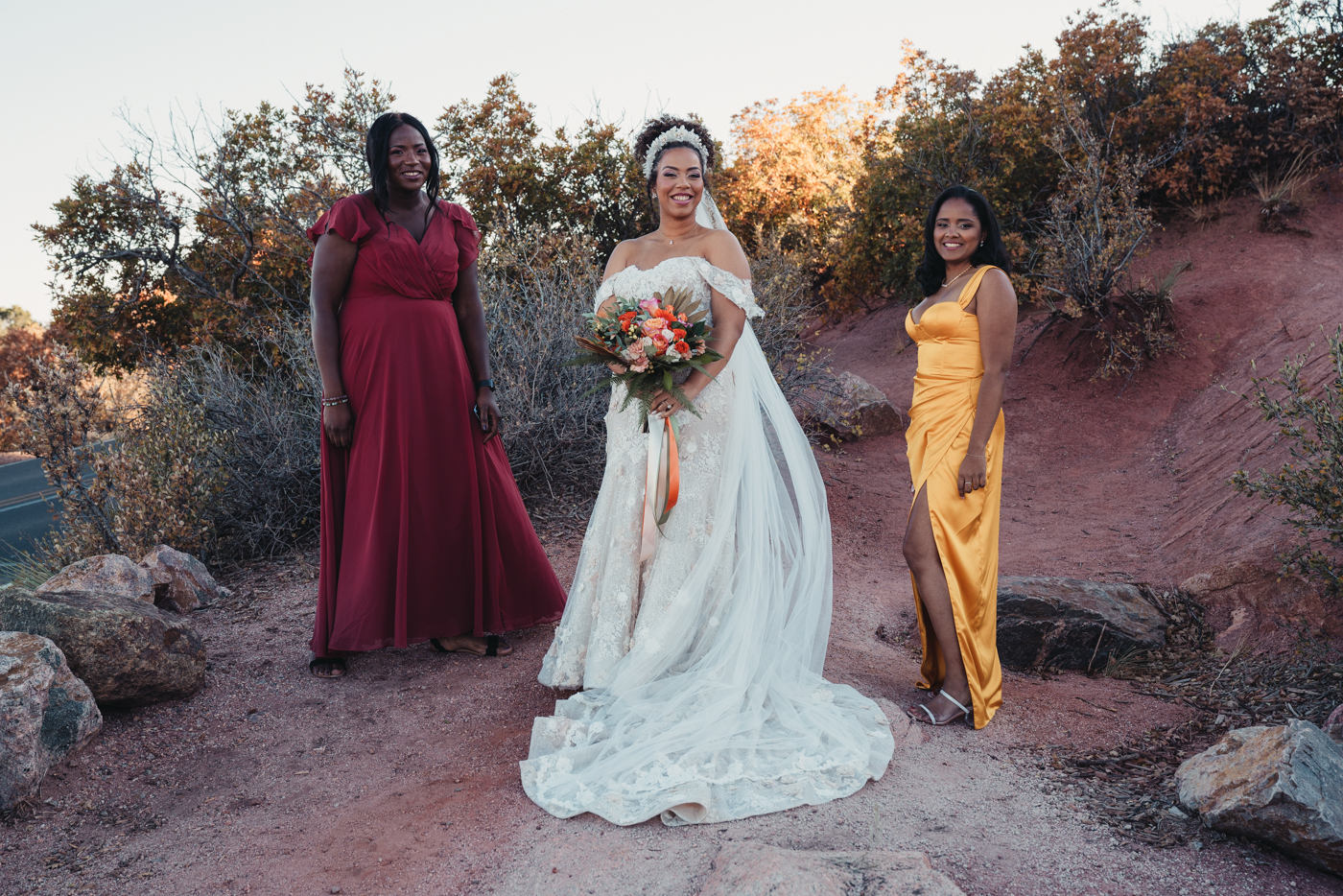 bride with bridesmaids at garden of the gods