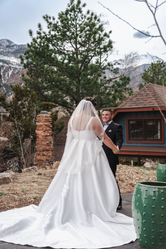 gay couple first look craftwood weddings manitou springs